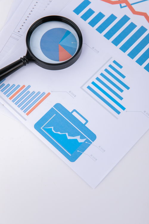 放大鏡報表辦公用品商務(wù)攝影圖 攝影